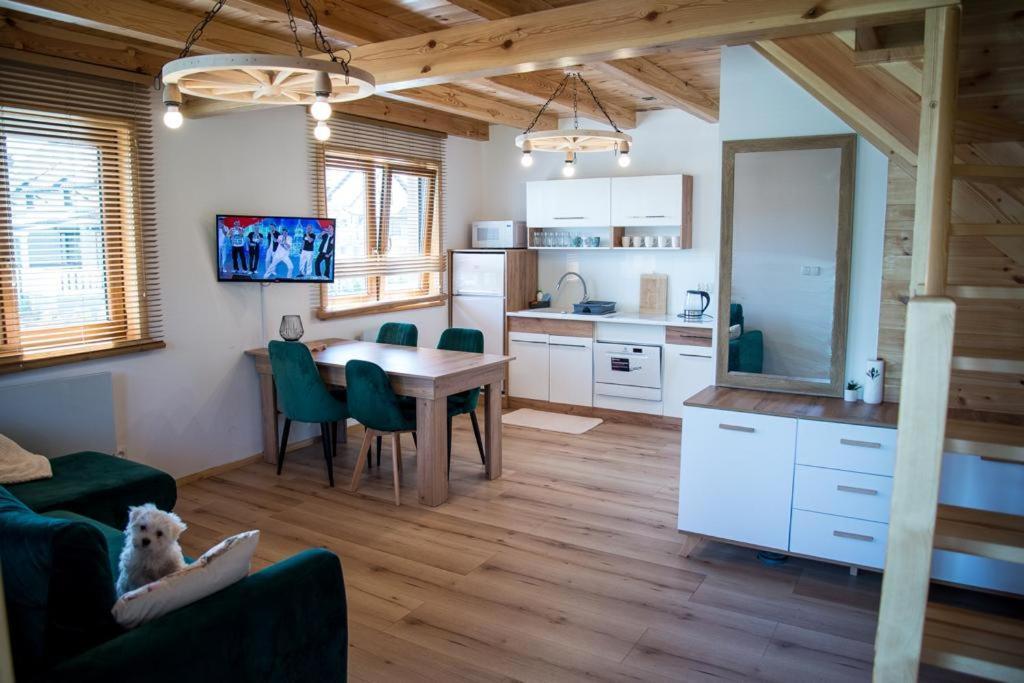 Kalinowy Sad Domki Z Jacuzzi I Sauna Mikołajki Exteriör bild